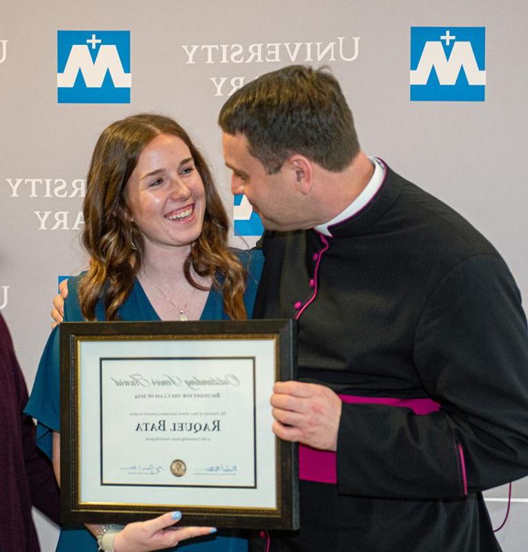 Raquel Bata with Monsignor